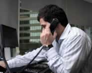 Man in bootcamp or bratcamp office talking to parents of a troubled teen